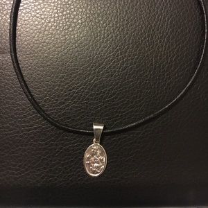 Peruvian leather necklace w/Peruvian virgen mary